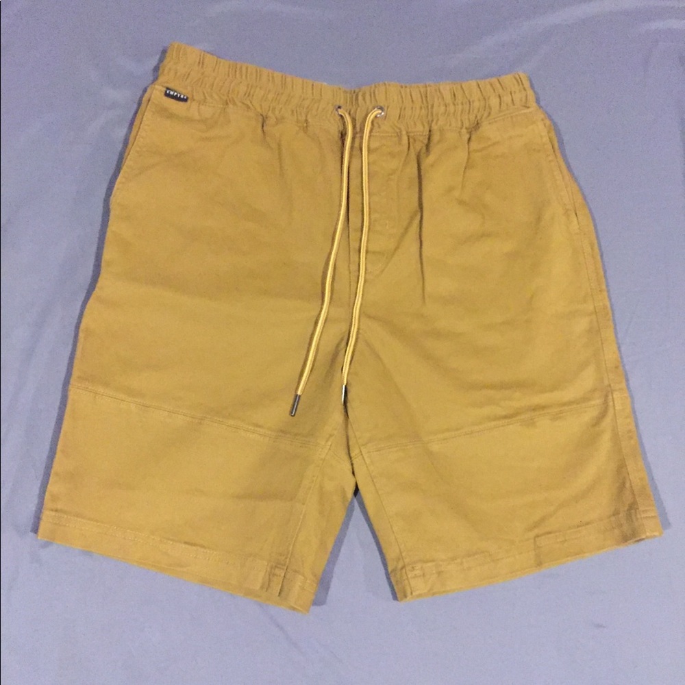 This is a pair of dark khaki chino’s by Empyre ...